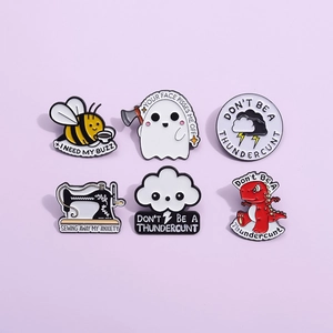 Cartoon enamel pin set with bee, ghost, clouds, sewing machine and red dinosaur