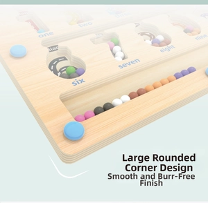 Detail of wooden magnetic color sorting maze with rounded safety edges for toddlers