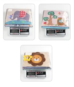 Detailed view of lightweight animal cloth books for babies with star-shaped teether accessory