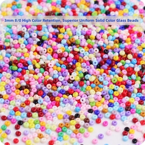 Macro detail of 3mm high-quality uniform opaque colorful glass seed beads for DIY jewelry