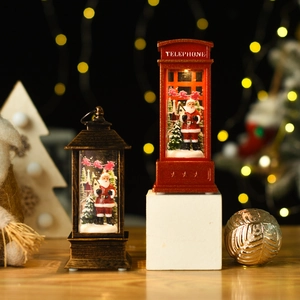 Macro detail of Santa Claus telephone booth and bronze lantern with warm LED lights