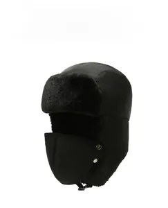 Detail of waterproof black trapper hat with thick faux fur lining and face mask