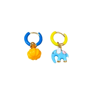 Cute asymmetric enamel elephant and pumpkin earrings with colorful finish on white