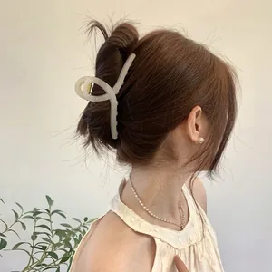 13cm minimalist cream resin hair claw clip for elegant bun hairstyles on model