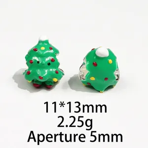 Detail of Christmas tree bead with green enamel and 5mm hole for DIY jewelry