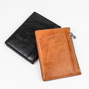 Slim leather card holder and coin purse in black and brown with multi-slot design
