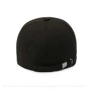 Rear view of black thermal baseball cap showing fine twill texture and metal buckle