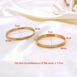 Detail view of 4mm and 6mm gold stainless steel bracelets with zircon and grid pattern