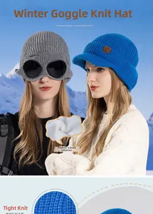 Detalle de gorro de punto de invierno con gafas integradas y forro de vellón blanco cálido