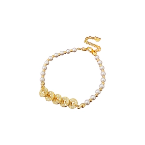 Elegant gold pearl bracelet with zircon copper coin links and a heart pendant charm