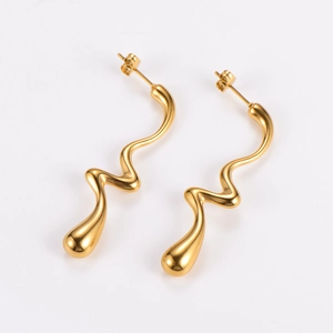 Minimalist golden wave drop earrings in polished metal with elegant sleek curves