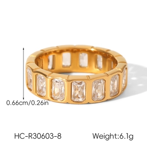 Detail showing width measurement of 0.66cm on the heart-shaped gold eternity ring