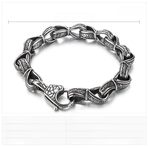 Detail view of heavy vintage stainless steel curb chain bracelet with measurements