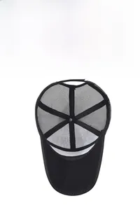 Detail view of the breathable mesh structure and interior design of the black trucker hat