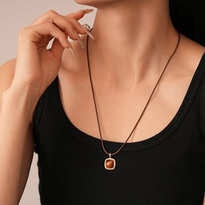 Vintage square amber resin pendant on dark brown cord necklace for autumn fashion