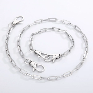 Detail of two silver square link stainless steel chains with double lobster clasps