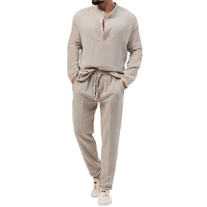 Men's casual linen two-piece set featuring long sleeve Henley shirt and drawstring pants