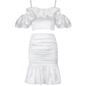 Elegant white satin two-piece set with pearl straps and ruffled off-shoulder top