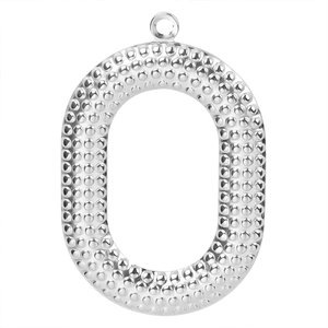 Detailed view of silver stainless steel oval pendant with a textured dotted surface