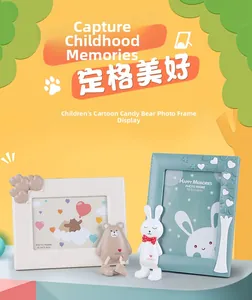 Detail of children's cartoon photo frames with cute bear and bunny resin ornaments