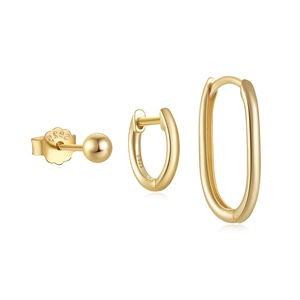 Detail of three-piece gold S925 sterling silver turquoise earring set with clear hallmarks