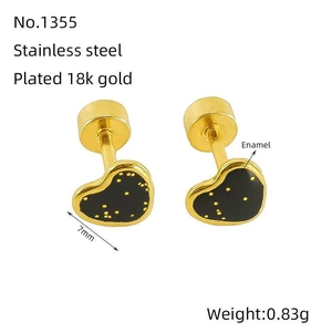 Detail view of 7mm heart stud earrings showing 18k gold plating and black enamel texture