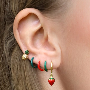 Detail of S925 sterling silver fruit earrings set worn on ear showing colorful charms