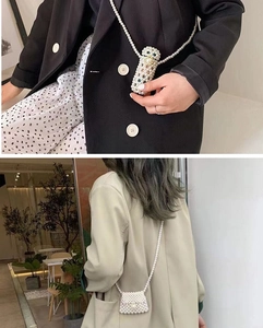 Detailed views of two handmade pearl beaded mini bags with elegant chain straps