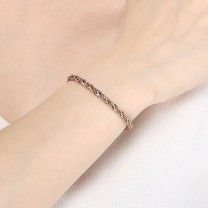 Chic 18K gold plated stainless steel twisted rope bracelet with purple woven silk thread