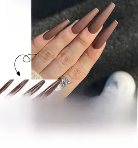 Macro detail of long mocha brown ballerina nails with glossy finish model view