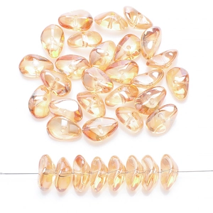 Close-up of 8x17mm peach iridescent glass petal beads with center hole for DIY jewelry