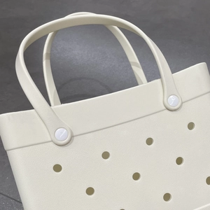 Close-up detail of lightweight EVA beach bag with DIY holes and sturdy handles