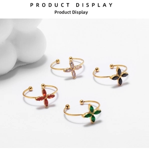 Detail shot of 18K gold plated clover rings with colorful zircon gemstones in four colors
