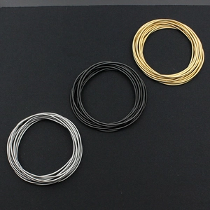 Minimalist 1.7mm stainless steel wire spring bracelets in gold, black, and silver