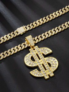 Detail of gold Cuban chain necklace with sparkling iced out dollar sign pendant