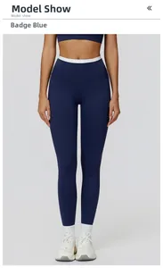 Detail der High-Waist Yoga-Leggings in Badge-Blau mit weißem Kontrastbund am Taillenteil