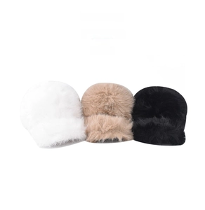 Detailed comparison of white, khaki, and black faux fur baseball caps with soft plush texture