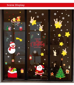 Detail of Christmas window clings featuring cartoon Santa, snowmen, and festive snowflakes