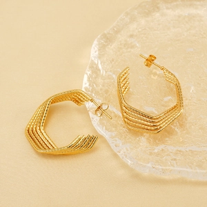 Minimalist 18k gold plated geometric U-shaped stud earrings with spiral texture finish