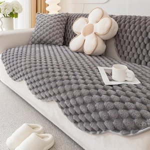 Detail shot of grey flannel chair cushion showing soft 3D plush fabric texture