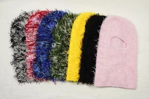 Detail of colorful knitted balaclavas with feather-like plush texture and soft yarn
