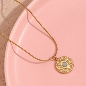 18K gold plated snake chain necklace with hammered eye coin pendant and blue stone