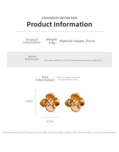 Detailed view of matte gold flower stud earrings with zirconia center and dimensions
