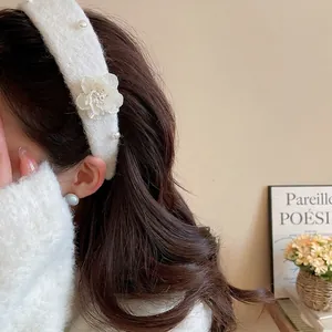Elegant cream knit headband with 3D floral accents and pearls for women