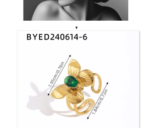 Detail of 18K gold butterfly ring with green gemstone inlay and size dimensions