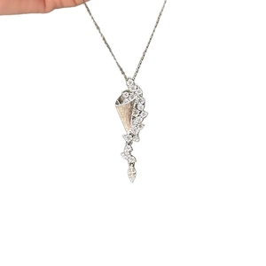 Silver hourglass pendant necklace with sparkling cubic zirconia on a delicate chain