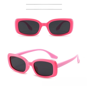 Detail view of colorful kids polarized sunglasses with flexible magenta silicone frames