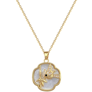 Gold titanium steel necklace featuring a shell woodpecker pendant with sparkly crystals
