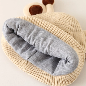 Kids warm winter knit hat with giraffe ears and soft gray fleece lining cream color