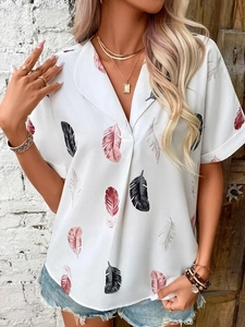Detail of V-neck lapel and pink feather print on white short sleeve chiffon blouse